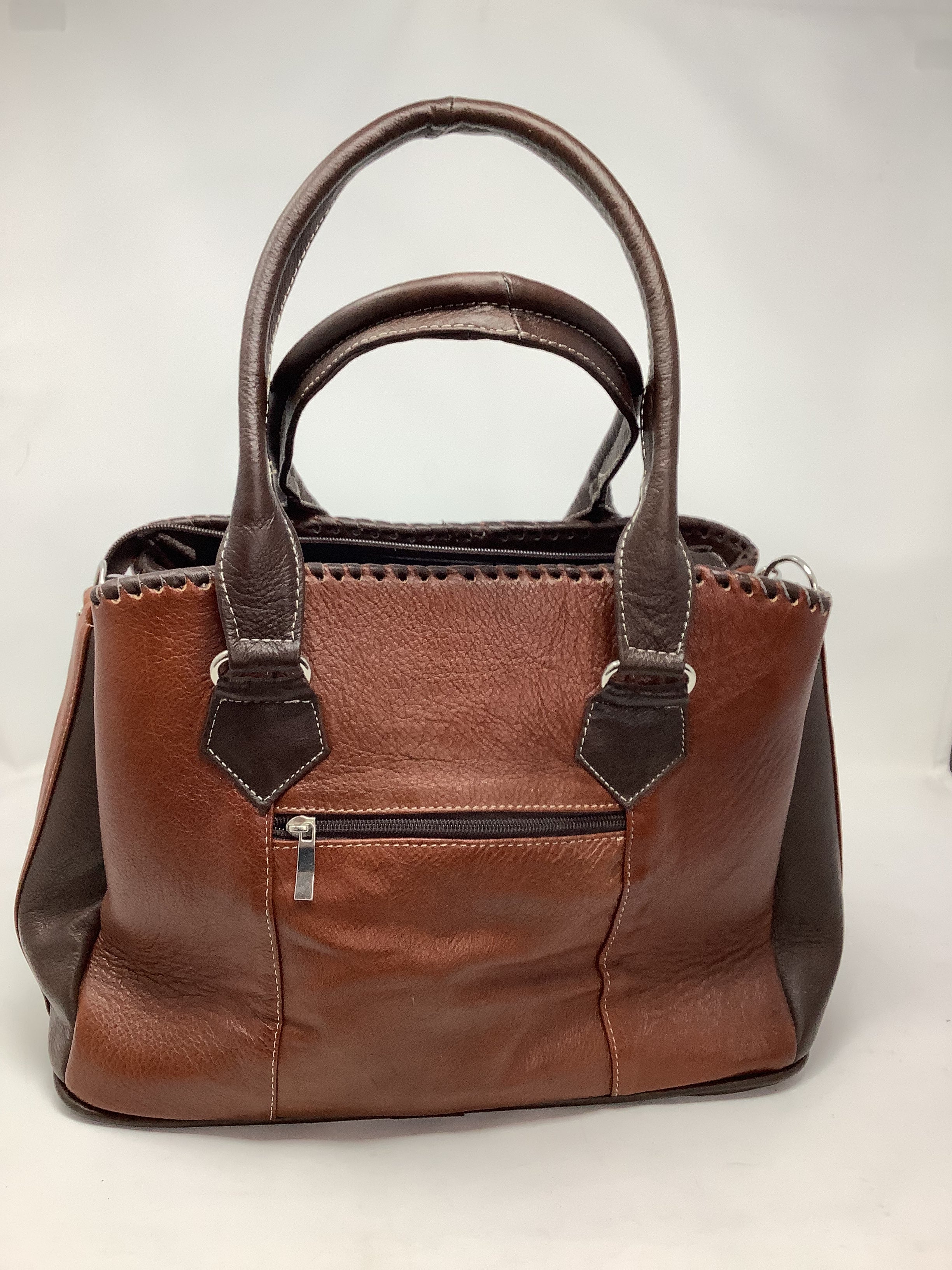 The hard leather hand bag